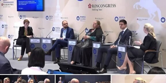 Panel discussion at the St. Petersburg International Economic Forum with five speakers on stage and audience in foreground.